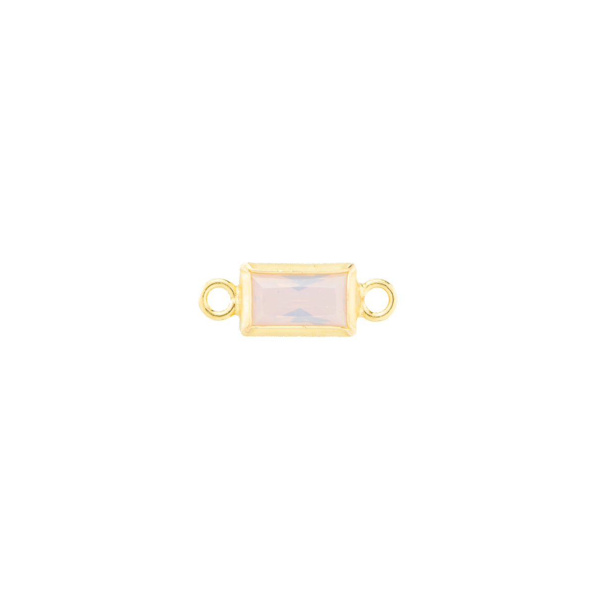 Gold earring with clear gemstone on a white background