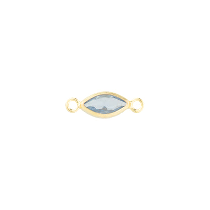 A gold-filled marquise-shaped connector charm with a iceblue faceted gemstone in the center and two small loops on either end, shown on a plain white background.