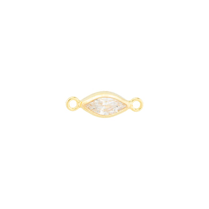 A gold-filled marquise-shaped connector charm with a clear faceted gemstone in the center and two small loops on either end, shown on a plain white background.