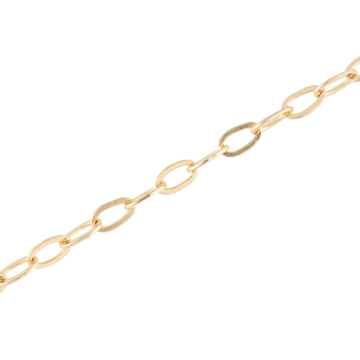 A close-up of a gold paperclip chain link necklace on a solid white background.